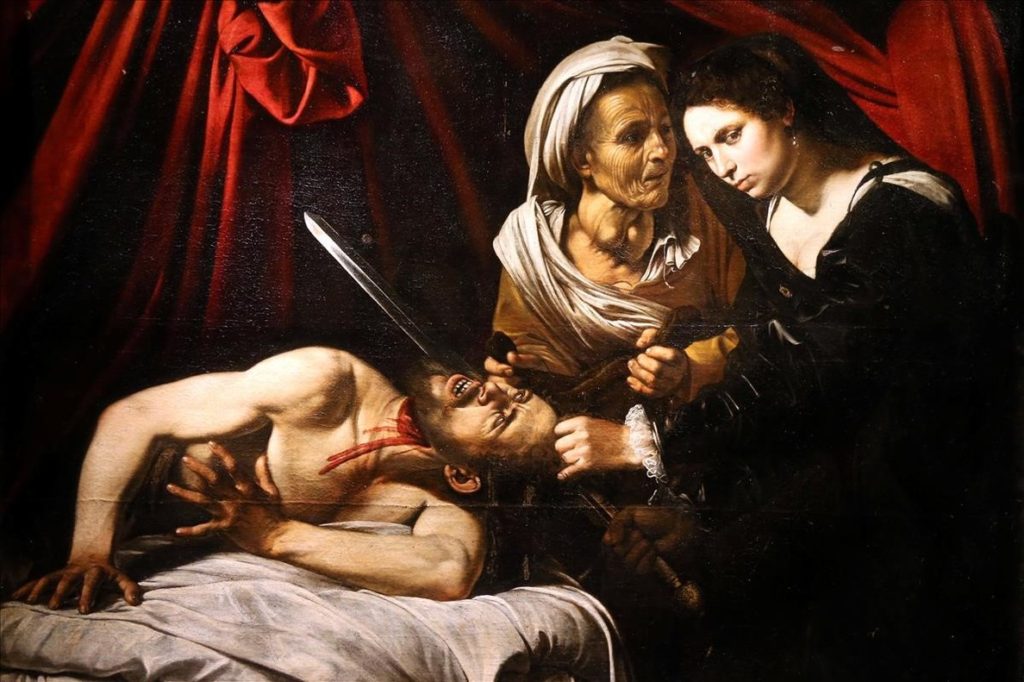 A detail of a painting entitled  Judith Beheading Holofernes  is pictured during its presentation in Paris  France  April 12  2016  that might have been painted by Italian master Caravaggio  1571-1610  and was discovered in an attic in Toulouse and could be worth more than 100 million euros    REUTERS Charles Platiau